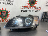 08-09 PONTIAC G8 GT LH AND RH HEAD LIGHTS OEM #542