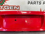 04-06 PONTIAC GTO LICENSE PLATE TRUNK FILLER PANEL RED #3801