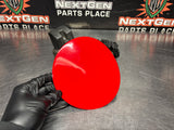 2004 PONTIAC GTO FUEL GAS DOOR ASSEMBLY TORRID RED OEM 92119899 #1043