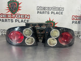 2006 PONTIAC GTO USED OEM REAR BLACK TAIL LIGHTS #547