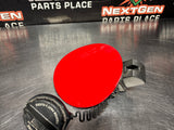 2004 PONTIAC GTO FUEL GAS DOOR ASSEMBLY TORRID RED OEM 92119899 #1043