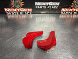 04-06 PONTIAC GTO SPICE RED ROCKER PANEL END CAP PAIR OEM #1027