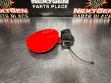 2004 PONTIAC GTO FUEL GAS DOOR ASSEMBLY TORRID RED OEM 92119899 #1027