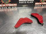 04-06 PONTIAC GTO SPICE RED ROCKER PANEL END CAP PAIR OEM #1027