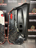 97-04 C5 CORVETTE DOOR PANELS BLACK/ FIRETHORN RED OEM #1150