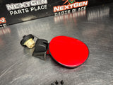 2004 PONTIAC GTO FUEL GAS DOOR ASSEMBLY TORRID RED OEM 92119899 #1306