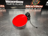 2004 PONTIAC GTO FUEL GAS DOOR ASSEMBLY TORRID RED OEM 92119899 #1027