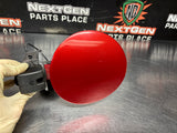 2006 PONTIAC GTO FUEL GAS DOOR ASSEMBLY SPICE RED OEM 92119899 #1293