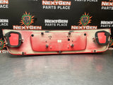 04-06 PONTIAC GTO LICENSE PLATE TRUNK FILLER PANEL TORRID RED OEM #1027