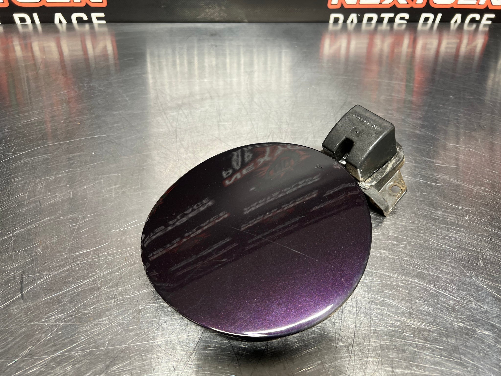 2004 PONTIAC GTO FUEL GAS DOOR ASSEMBLY COSMOS PURPLE OEM 92119899