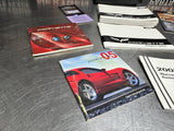 2005 C6 CORVETTE OWNERS MANUAL and DVDS OEM #1030
