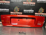 04-06 PONTIAC GTO LICENSE PLATE TRUNK FILLER PANEL SPICE RED OEM #1293