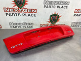 04-06 PONTIAC GTO LICENSE PLATE TRUNK FILLER PANEL RED #3801