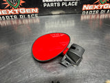 2004 PONTIAC GTO FUEL GAS DOOR ASSEMBLY TORRID RED OEM 92119899 #1438