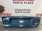 04-06 PONTIAC GTO LICENSE PLATE TRUNK FILLER PANEL BARBADOS BLUE OEM #693