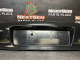 04-06 PONTIAC GTO LICENSE PLATE TRUNK FILLER PANEL BLACK OEM #3939