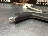 04-06 PONTIAC GTO E BRAKE RED STITCH HANDLE OEM #1043