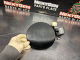 2004 PONTIAC GTO FUEL GAS DOOR ASSEMBLY BLCK OEM 92119899 #1191