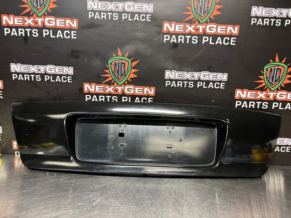 04-06 PONTIAC GTO LICENSE PLATE TRUNK FILLER PANEL BLACK OEM #3939