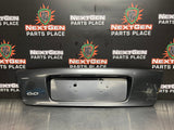 04-06 PONTIAC GTO LICENSE PLATE TRUNK FILLER PANEL CYCLONE GRAY #901