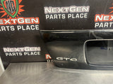 04-06 PONTIAC GTO LICENSE PLATE TRUNK FILLER PANEL BLCK OEM #1691