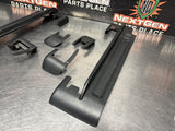 04-06 Pontiac GTO Front / Rear Seat Track Cover Trim SET USED OEM