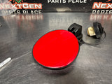 2004 PONTIAC GTO FUEL GAS DOOR ASSEMBLY TORRID RED OEM 92119899 #1306