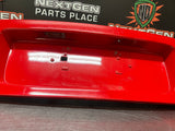 04-06 PONTIAC GTO LICENSE PLATE TRUNK FILLER PANEL TORRID RED OEM #1027