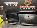 04-06 PONTIAC GTO LICENSE PLATE TRUNK FILLER PANEL BLACK OEM #3939