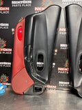 97-04 C5 CORVETTE DOOR PANELS BLACK/ FIRETHORN RED OEM #1425