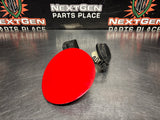 2004 PONTIAC GTO FUEL GAS DOOR ASSEMBLY TORRID RED OEM 92119899 #1043