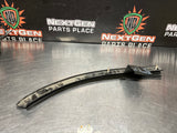 05-13 C6 CORVETTE LEFT REAR QUARTER FENDER TO BUMPER BRACKET OEM #1038