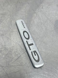 04-06 PONTIAC GTO AIR BAG DASHBOARD BADGE EMBLEM USED OEM