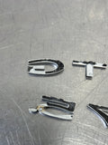 04-06 PONTIAC GTO LICENSE PLATE TRUNK FILLER PANEL GTO 5.7 BADGE EMBLEMS #164